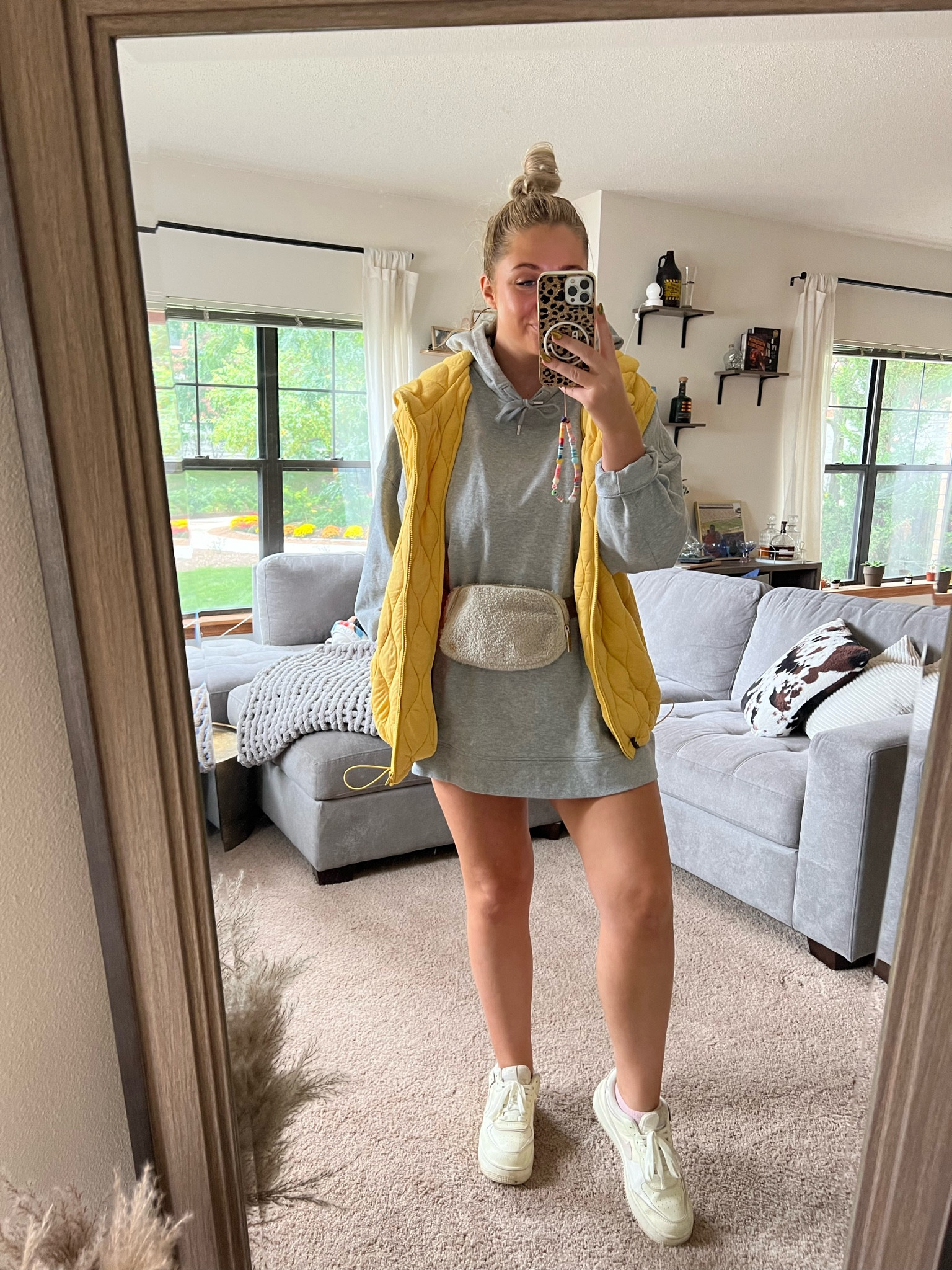 14 in the sweatshirt medium in the vest. Great casual fall outfit 