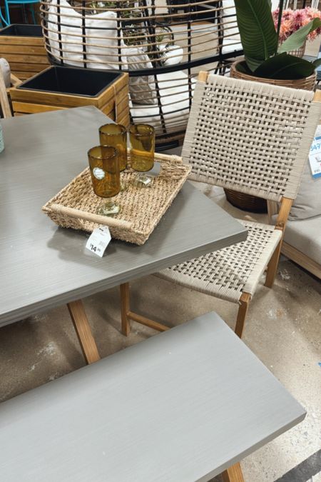 Park City Patio Dining Table, $300
2-Piece Park City Patio Dining Chairs $250
Natural Seagrass Rectangle Basket $15