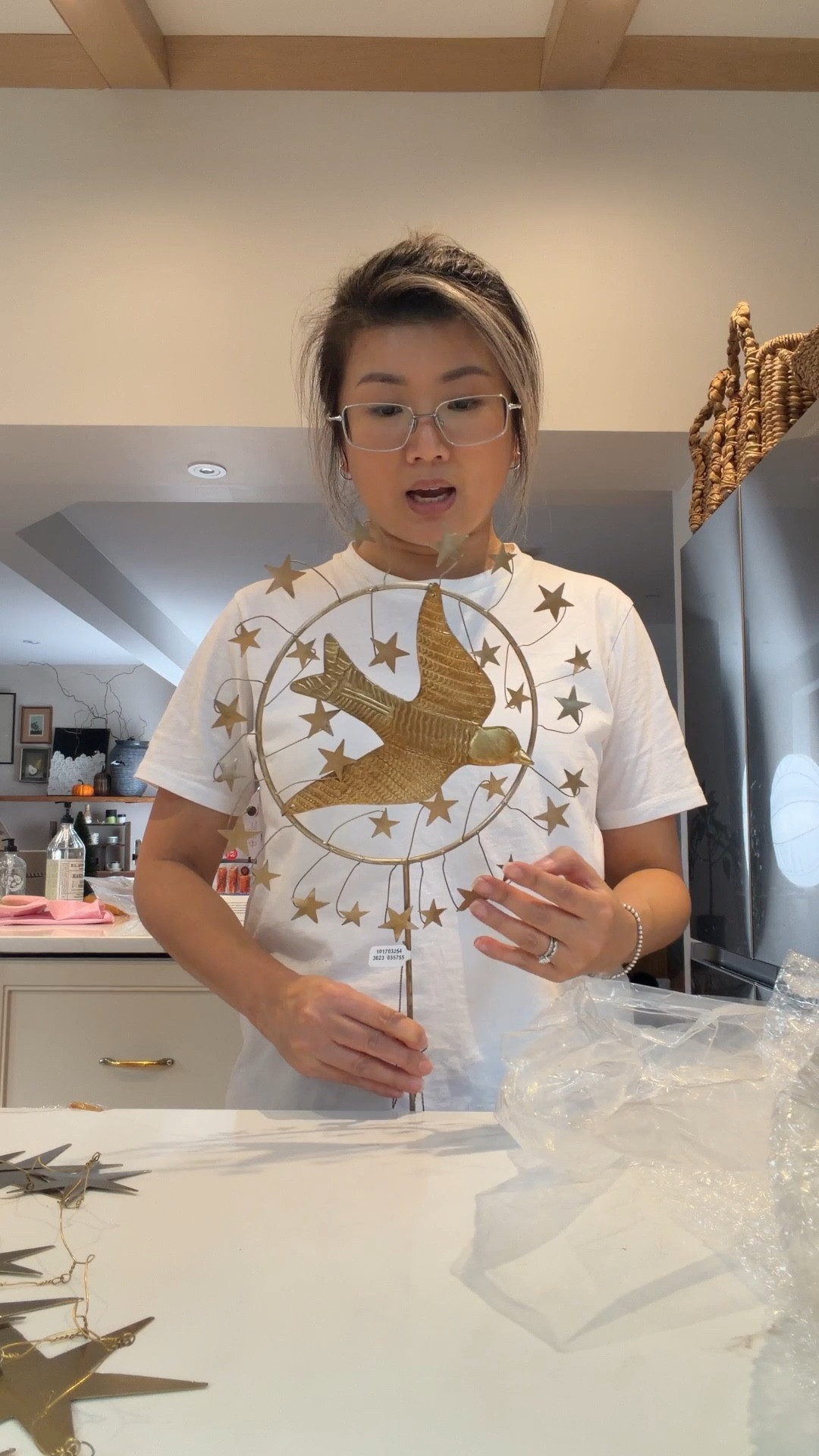 This is the prettiest tree topper I’ve ever seen. And you can use it as art or display it on its base on your shelves or coffee table. It looks delicate and so pretty. I love the stars and sparrow motif  

#LTKHome #LTKSeasonal #LTKHoliday