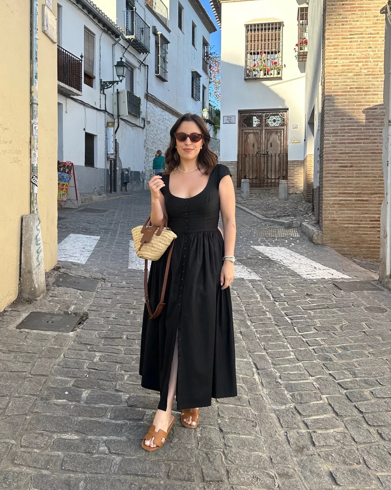 The most perfect black midi dress for summer; so incredibly flattering and I am obsessed! Wearing a size 2, and I also linked this adorable mini basket bag and flats!

summer dress, lbd, steve madden flats, mini basket bag, date night look, effortless chic, summer wardrobe staple

#LTKootd #LTKPetite #LTKU