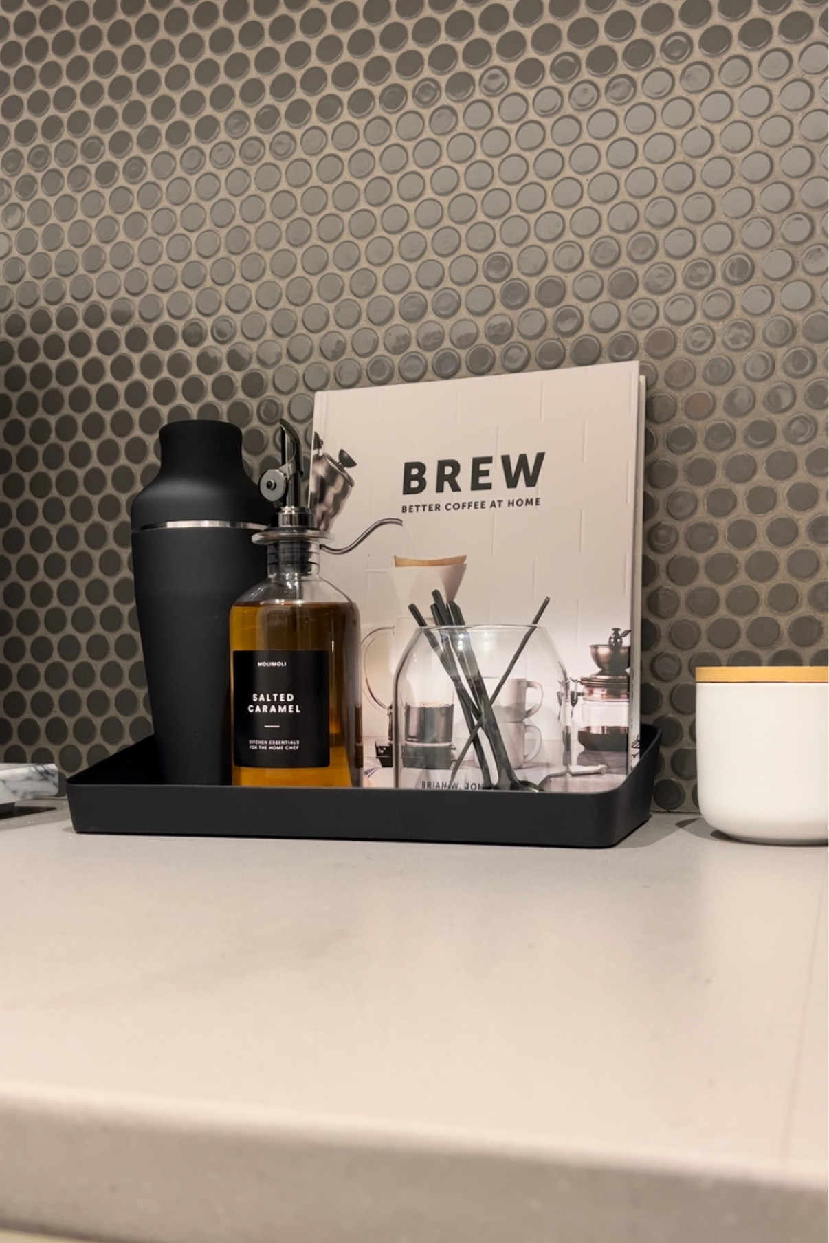 Who else is obsessed with the shaken espresso oat milk latte? I switched around my coffee station so I could make them at home! I add the espresso and syrup to a shaker of ice then pour it into a glass of ice and top with oat milk. Let me know if you try it!  #coffee #coffeestation #pantry

#LTKFind #LTKhome