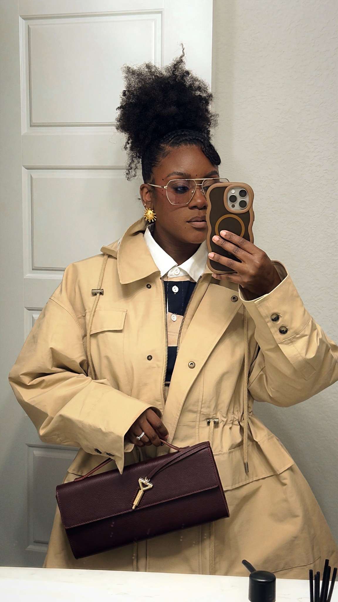 Cinched waist trench jacket with shoulder padded rugby shirt 