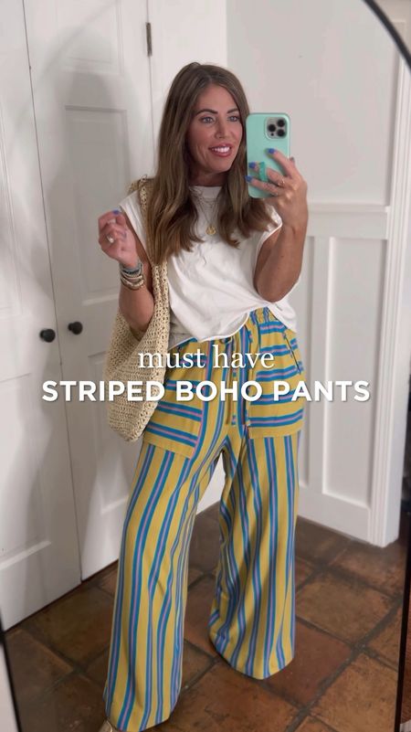 Both of these pants are absolutely amazing. I love the comfy fit, and the stripes are the cutest. I sized down to a small in both. The first pair is a linen/cotton blend and they run very oversized
The second pair is a linen cotton blend.

This super lightweight oversized muscle tank is also from free people and only $28
It comes in several colors & you will want to live in this all summer.

Straw hobo shoulder bag is 50% off and I perfect for summer

Birkenstock sandals

Square neck seamless tank from Aerie- size medium 

Fitted denim vest from target - tts
I’m wearing a medium 

Birkenstock big buckle sandals -tts

#LTKOver40 #LTKFindsUnder100 #LTKStyleTip