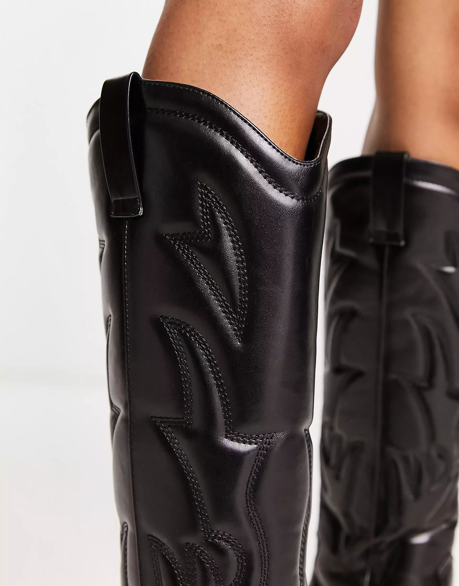 NA-KD x Moa Mattsson knee high western boots in black | ASOS (Global)