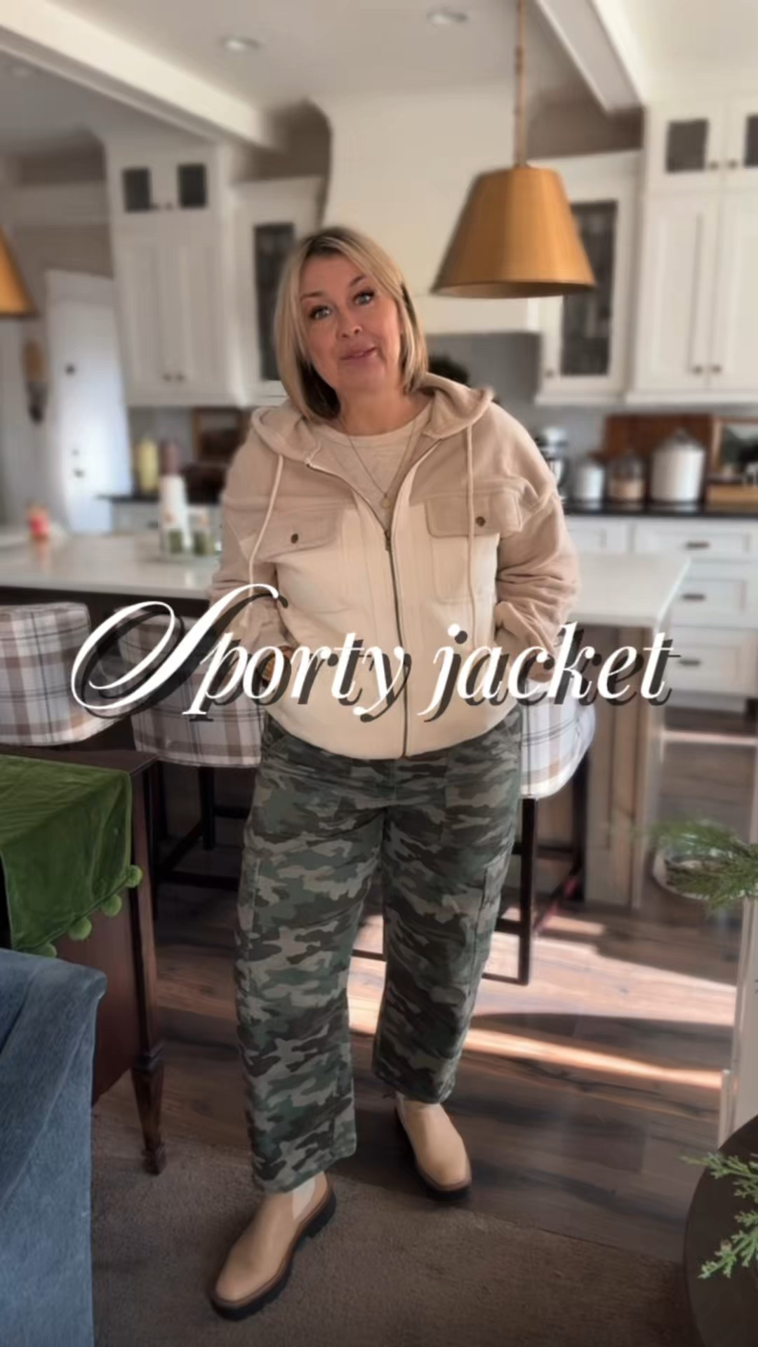 midlife sporty style. women over 40 outfits. casual everyday style. beige zip jacket. 

Some days I want an outfit that looks put-together without trying too hard… and this sporty jacket with camo pants is exactly that combo. Perfect for running errands, school pickups, dog walks, or just feeling casually cute at home. 
sporty hoodie jacket. camo cargo pants outfit. midsize fashion inspiration. fall winter casual look. neutral sporty jacket. comfy feminine style. women 50 plus fashion. stylish but comfortable outfit. elevated casual outfit ideas.