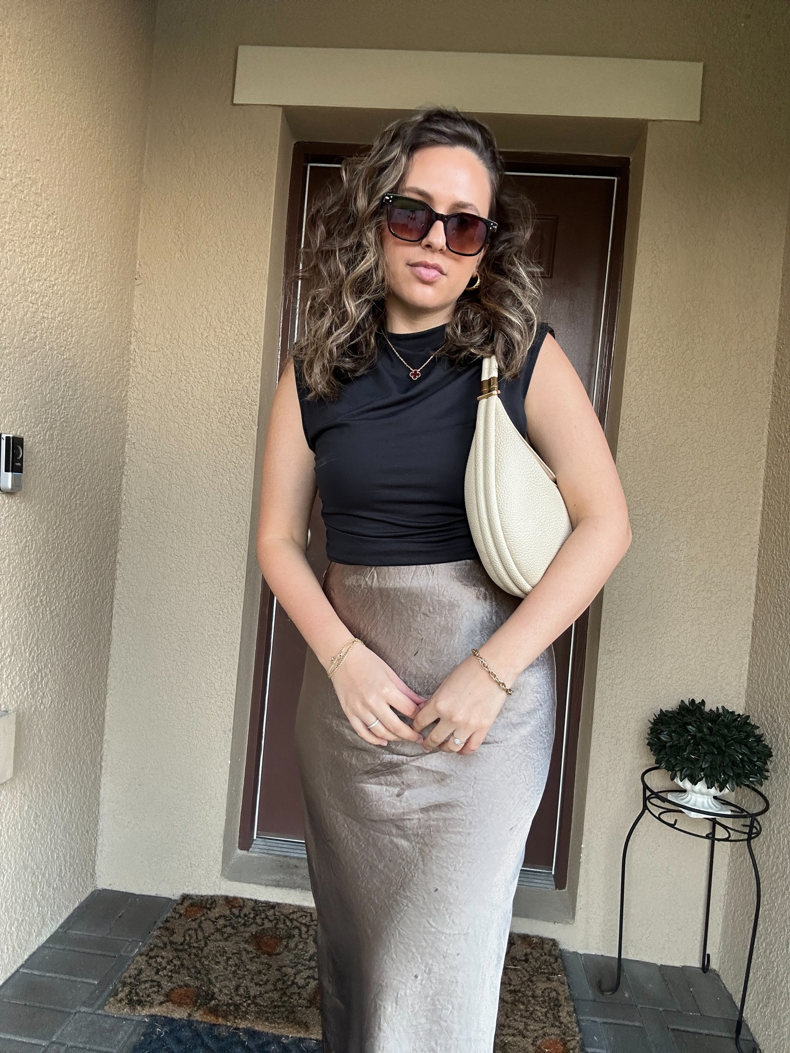 Spring style inspo featuring a satin skirt and a black basic wardrobe essential 

#LTKfindsunder50 #LTKfindsunder100 #LTKitbag