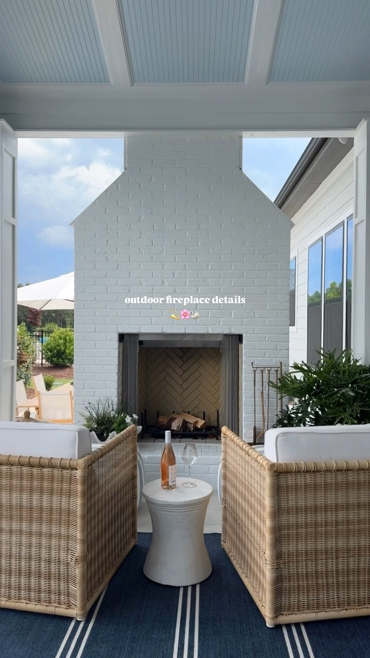outdoor fireplace details ✨ | I loved designing this little spot, it’s truly my favorite 😍 listing all the details below:

paint: high reflective white sw7757
thin brick veneer with a 12 inch hearth 
42” insert with herringbone brick interior
wood burning fireplace w/ a gas line starter (lights the wood instantly without having to struggle to start the fire using matches or a lighter)
fireplace is 75.5” wide 
historic limestone tile for the floors

furniture is @serenaandlily 💕

save + share for inspo! 
#outdoorliving #outdoordesign #outdoorfireplace #outdoorfurniture #outdoordecor #fireplace #serenaandlily 

#LTKSaleAlert #LTKHome #LTKSeasonal
