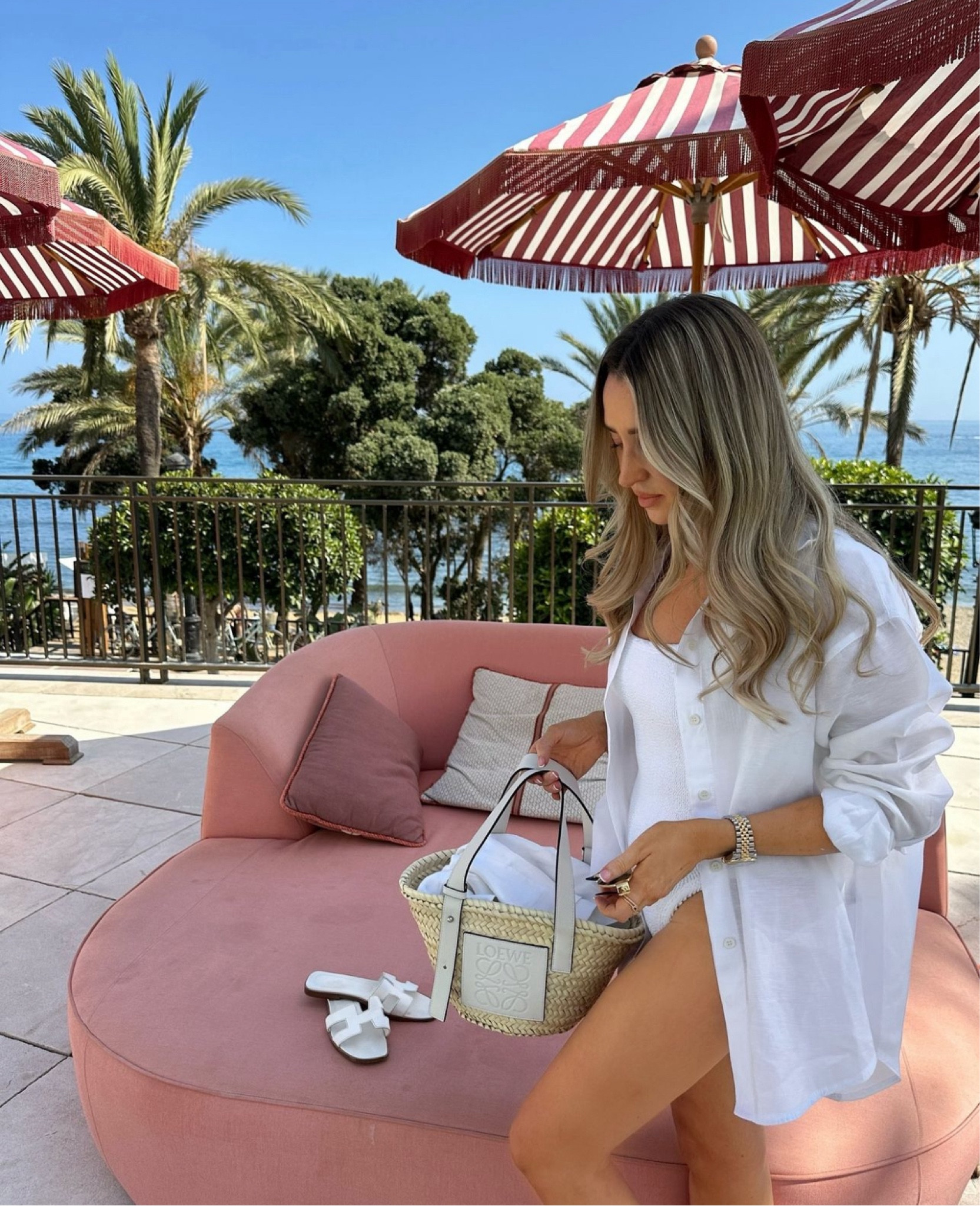 Marbella in white 🤍 classic Hunza G swimsuit with linen shirt and white Hermes and Loewe bag

#LTKeurope #LTKswimwear #LTKsummer