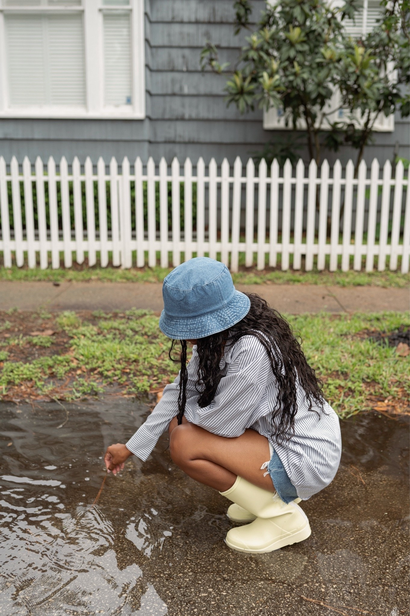 Denim bucket hat, striped oversized button down, denim shorts, rain boots

#LTKootd