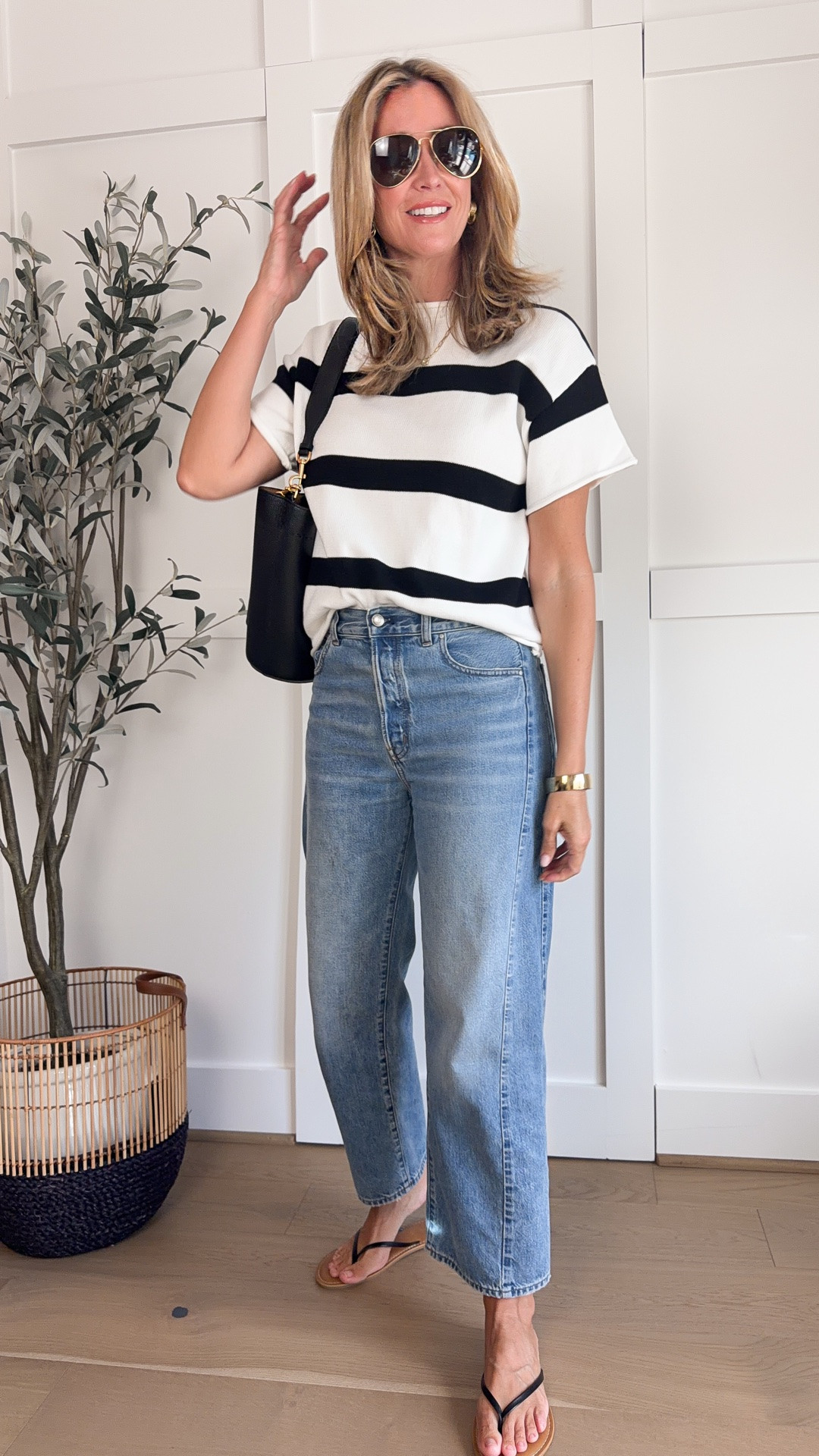 Casual fall outfit with jeans, lightweight knit sweater, sandals and black bucket bag

#LTKOver40 #LTKTall #LTKootd