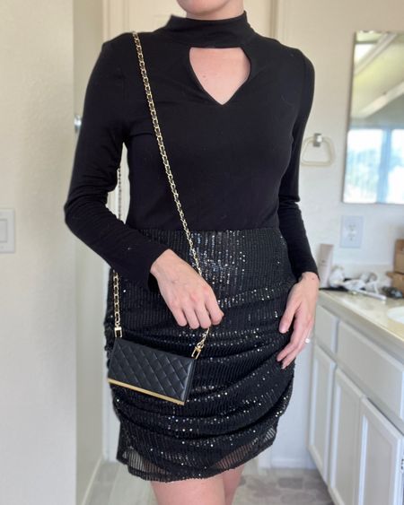 Black choker long sleeve | Black sequin mini skirt | phone case that doubles as a purse/wallet

#LTKitbag #LTKstyletip #LTKFind