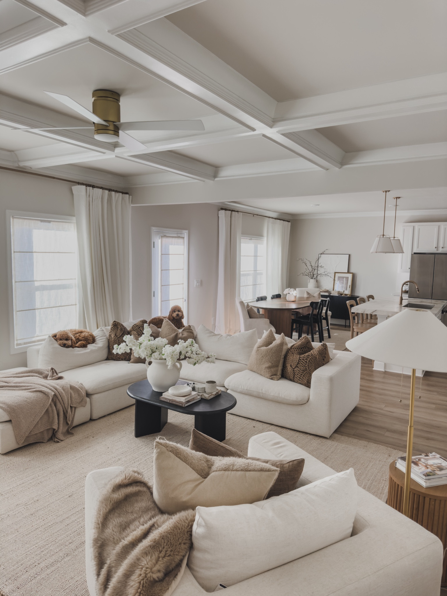 Light and bright open contact home styled with creamy whites, dark furniture accents, warm browns and all the textured neutrals. Using a handwoven jute rug to ground the space. 

Furniture finds, wayfair finds, cozy sectional, castlery, joss and main, Lowe’s, curtain details, shop the look

#LTKHome #LTKStyleTip #LTKSaleAlert