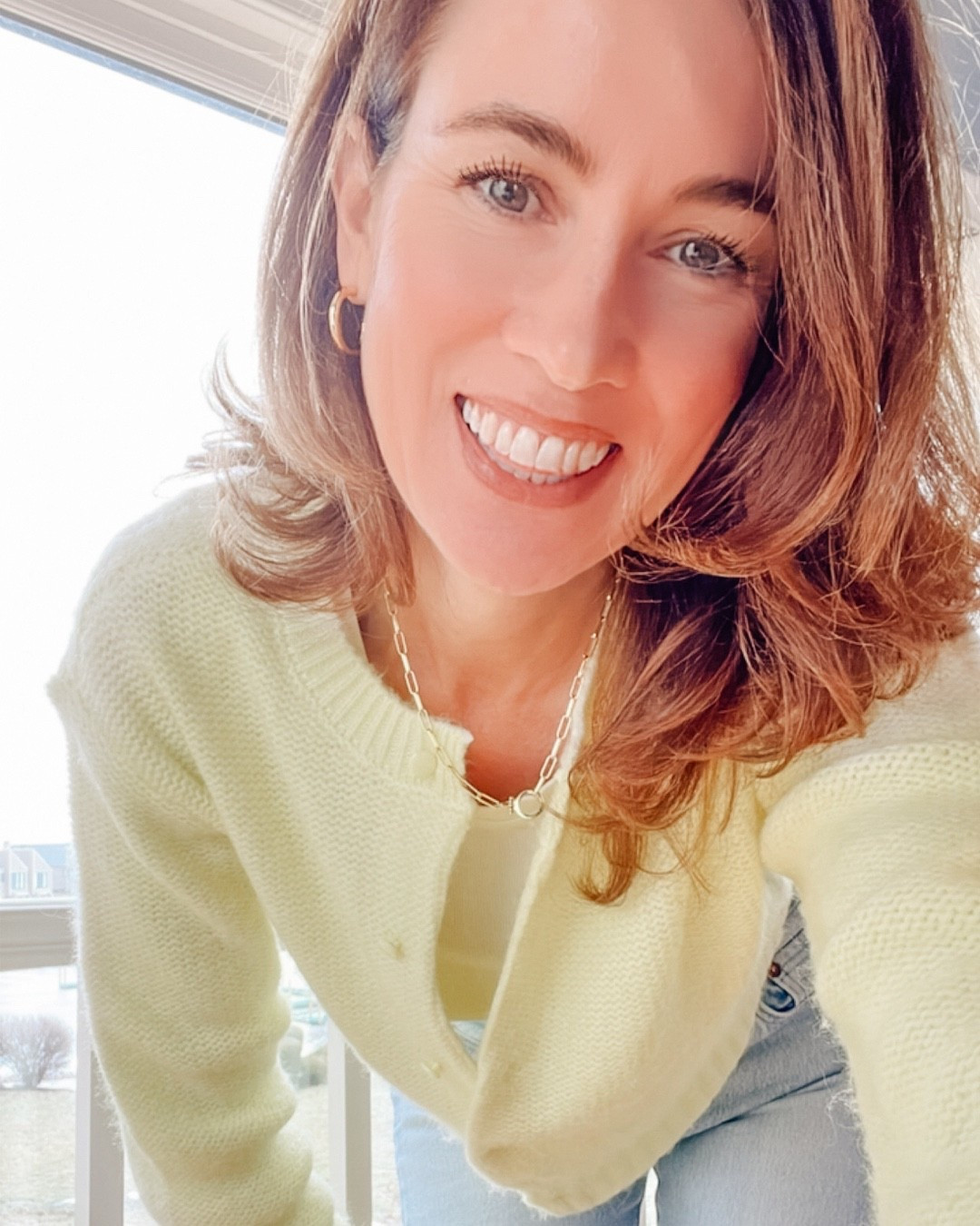 Sweater of the day: winter outfits women - outfit Butter yellow cardigan with LOFT crewneck tee and Gorjana chain necklace. #yellowsweater #butteryellow #springsweaters #yellowtrending #2026colors 

#LTKOver40 #LTKootd #LTKSeasonal