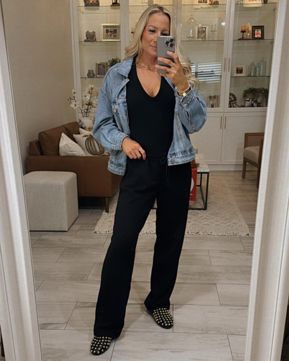 Cozy girl Thanksgiving outfit! Or any holiday or everyday outfit for that matter! Studded denim jacket, studded mules/slides, stretchy sweat pants, such a comfortable combo!

#LTKSaleAlert #LTKFindsUnder50 #LTKStyleTip