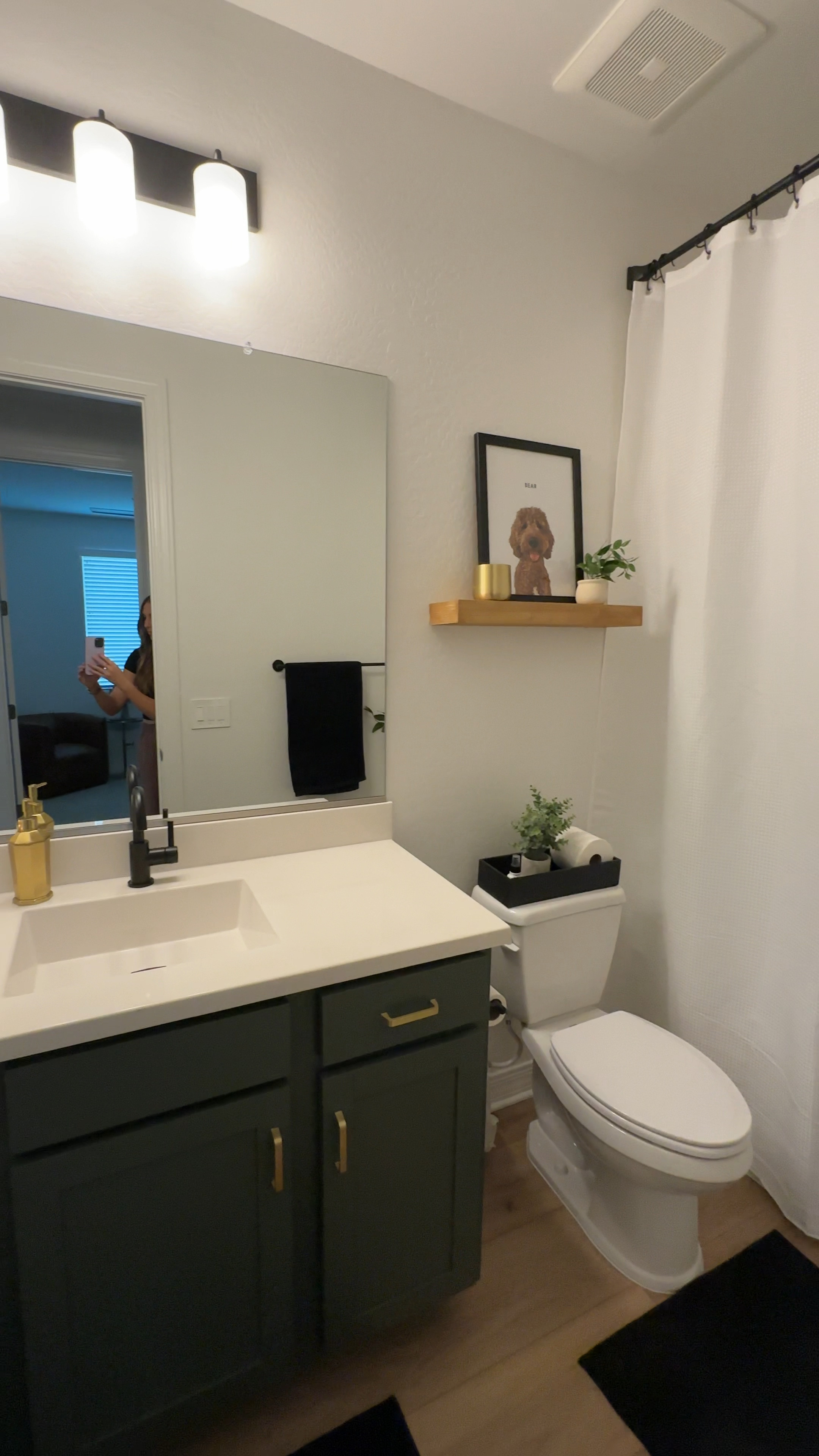 Guest bathroom! Cabinet Paint color is Pewter Green