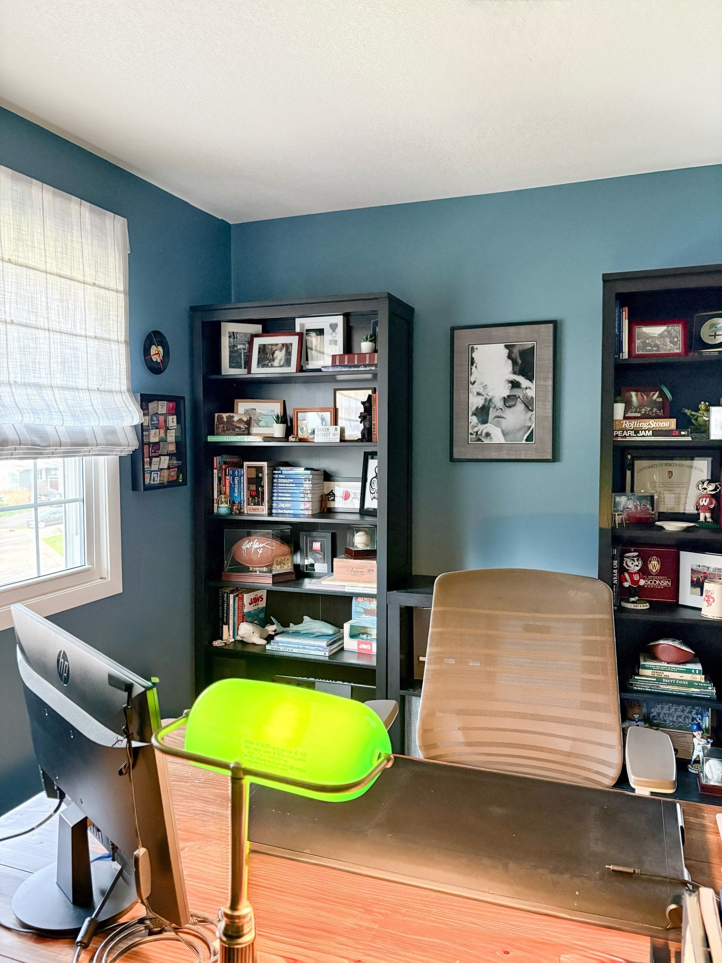 Office glow-up, but make it cozy. ✨
I realized I never shared some still shots of this space after the mini makeover — so here they are. A simple refresh that made a big difference, filled with his favorite things, fresh Roman shades to soften the light, and styled bookshelves that finally feel finished. This room now feels calm, functional, and very “him.” 🤍

Shades by @twopagescurtains ✨
#twopageshome #homedecor #homeoffice #interiordesign #cozyhome