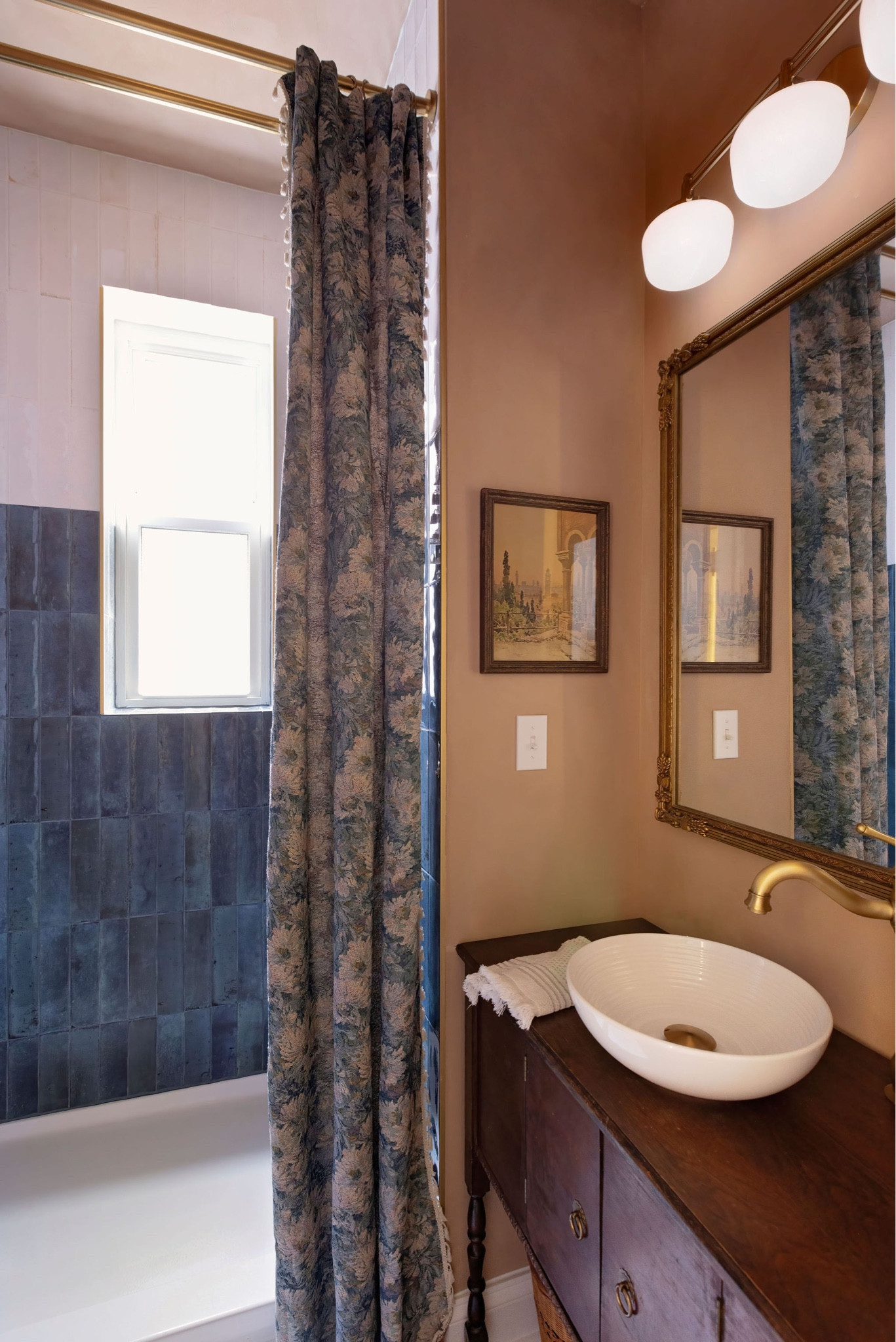 Welcome to our vintage euro-inspired bathroom 🥹🫶 I painted the walls using a faux Roman clay paint method, Bry installed some moody color blocked tile in the shower, and we repurposed a vintage buffet to create our vanity sink. 🤍

#LTKstyletip #LTKhome