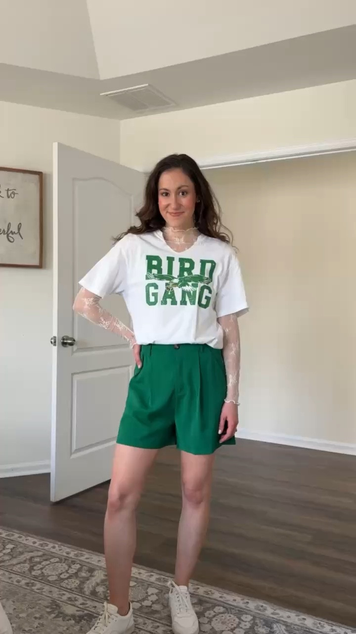 BIRD GANG graphic t shirt layered over a lace top with green shorts + white sneakers - perfect Philadelphia eagles Super Bowl outfit 🦅💚

#LTKWatchNow #LTKSeasonal #LTKStyleTip