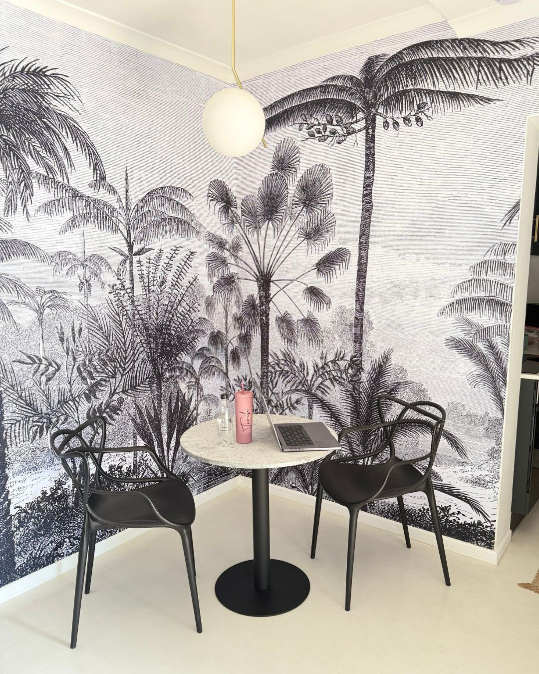Bold, chic, and built for two. This black & white bistro setup brings vacation vibes home—with palm print wallpaper stealing the spotlight. 🌴🖤 Tap to shop the full look! 

 #LTKHome #LTKSaleAlert #LTKStyleTip