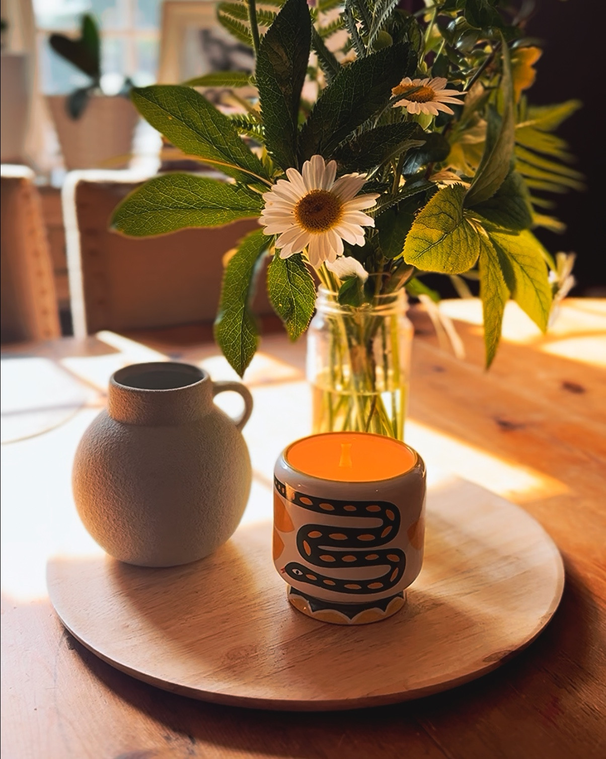 This is our only table — where we eat, drop keys, and light a candle just because. The entire inspired look is linked and under $100. 

Cozy, simple summer table decor with candles, wood, glass, and garden-inspired touches.

#LTKHome #LTKSeasonal