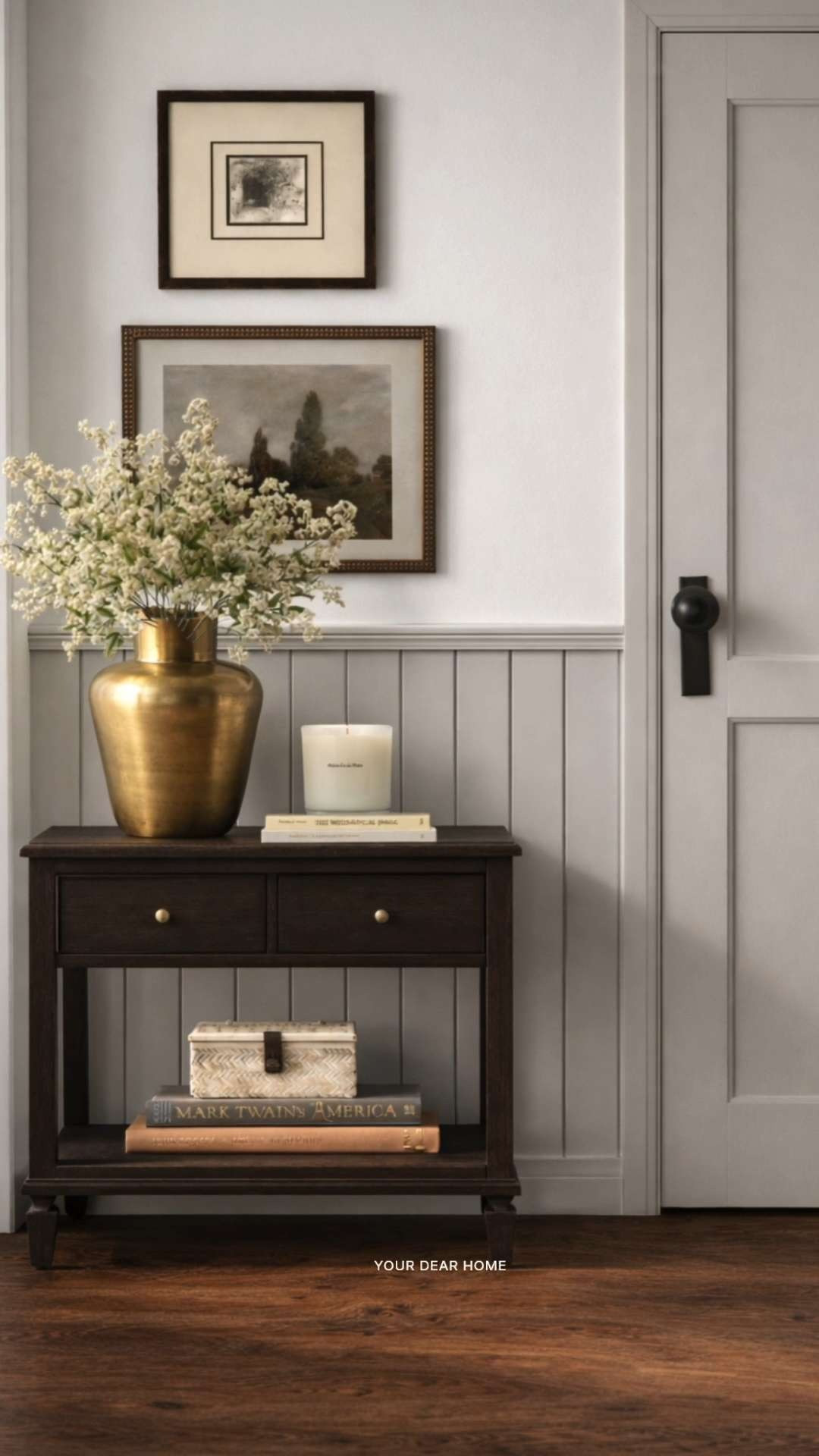 This is one of those setups that never fails. A darker console anchors the space, and that oversized brass vase does all the heavy lifting. Add a couple of stacked books and classic art above, and suddenly your hallway feels like part of the home, not just a pass-through. 

 #LTKHome