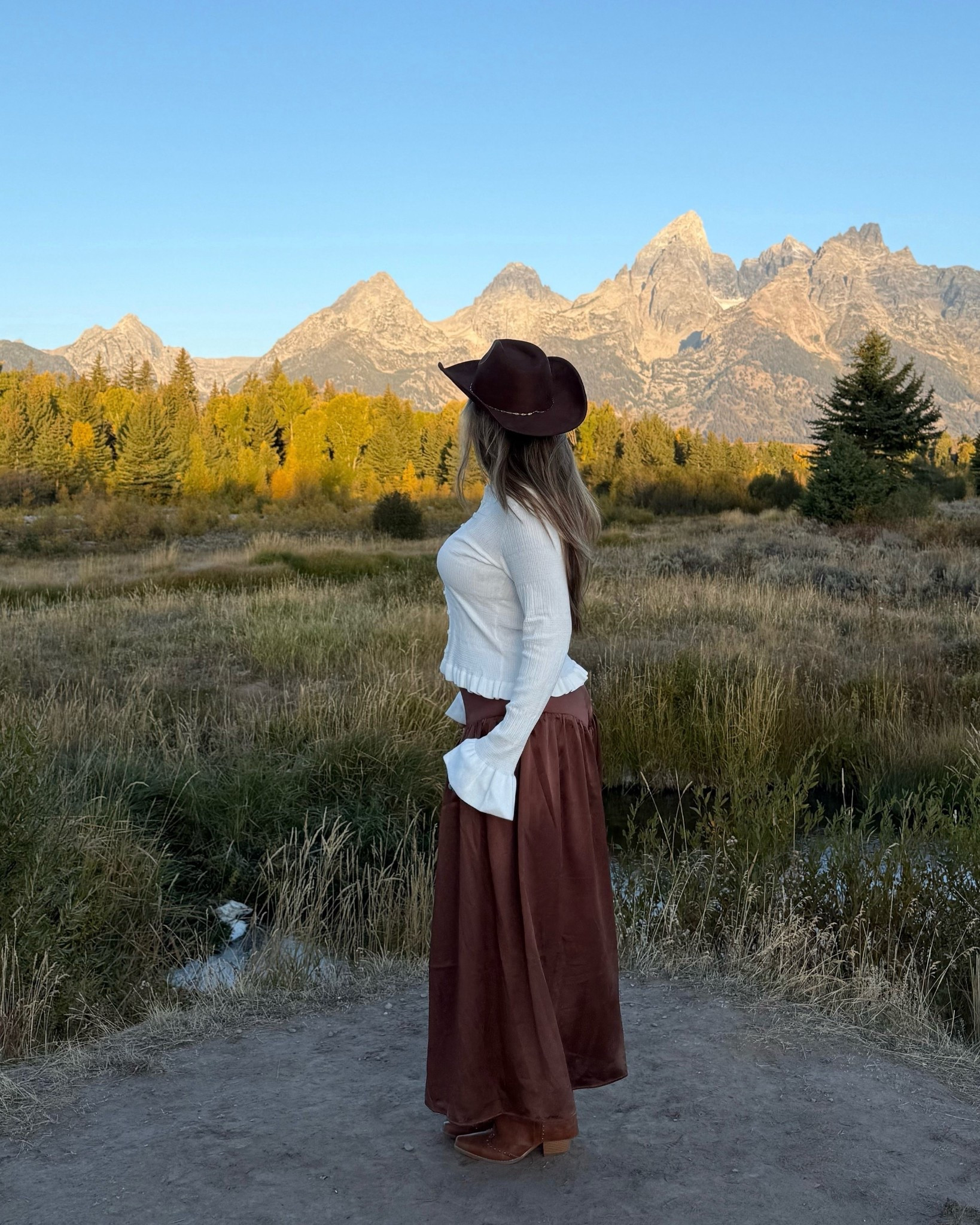 Cowgirl chic, Jackson hole Wyoming, western chic, western boots, maxi skirt, white sweater, cowgirl boots, brown boots, brown skirt

#LTKStyleTip #LTKSeasonal #LTKFindsUnder100