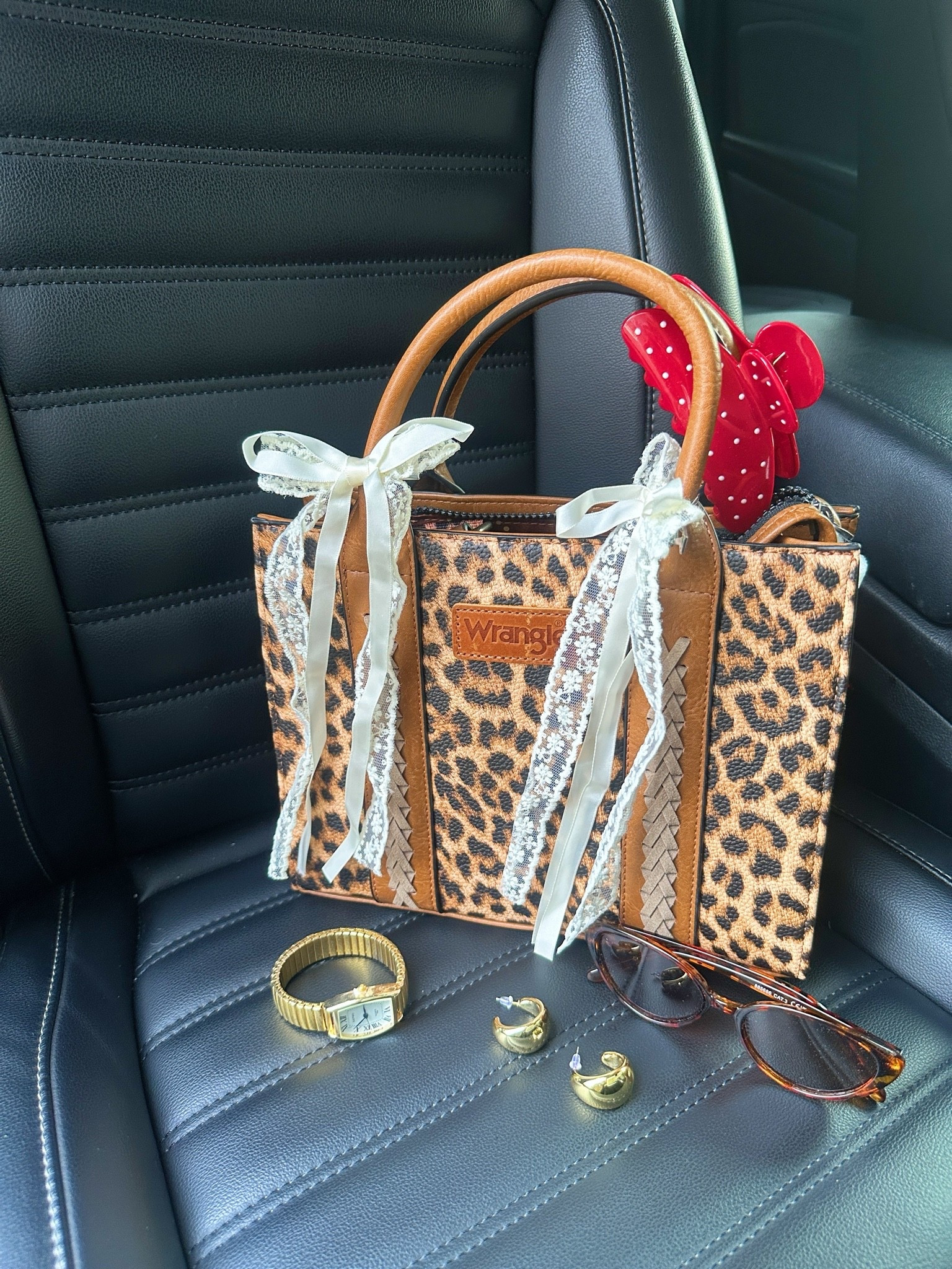 My new favorite leopard print wranlger tote bag! 🐆🤎✨

#LTKootd #LTKdayinmylife #LTKSaleAlert