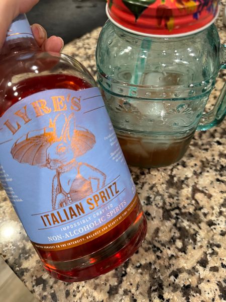 Really love this Lyre’s spritz for a non alcoholic option that gives an aperol spritz vibe- I mix with Topo Chico and a squeeze of citrus!  

#LTKParties #LTKHome #LTKSeasonal