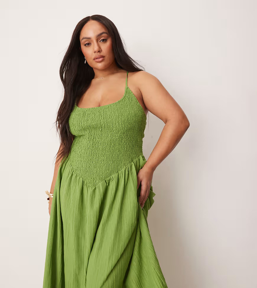 ASOS DESIGN Curve scoop neck crinkle maxi dress with cross back in green | ASOS (Global)