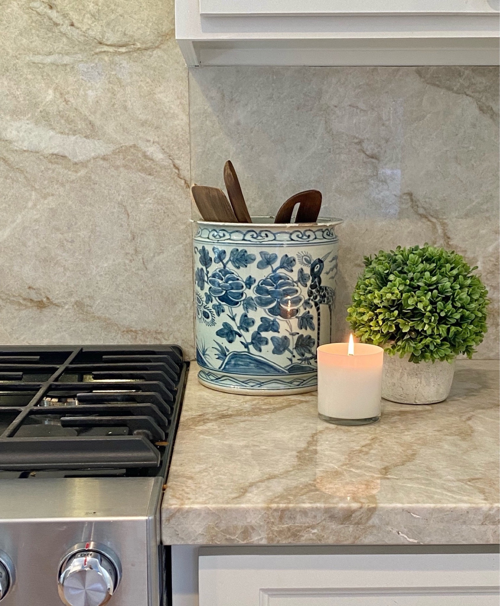 Linking my orchid pot I use to hold wooden spoons as wells as some other pretty ones!


#LTKhome #LTKstyletip