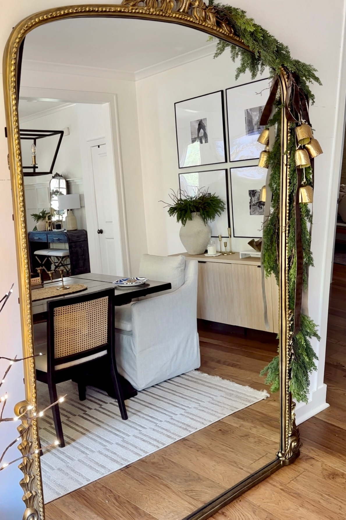 Floor mirror decorated for Christmas! Love these cedar garlands for a real looking garland and the just add bells and ribbon! Holiday decor for your home 

#LTKSeasonal #LTKHoliday #LTKHome