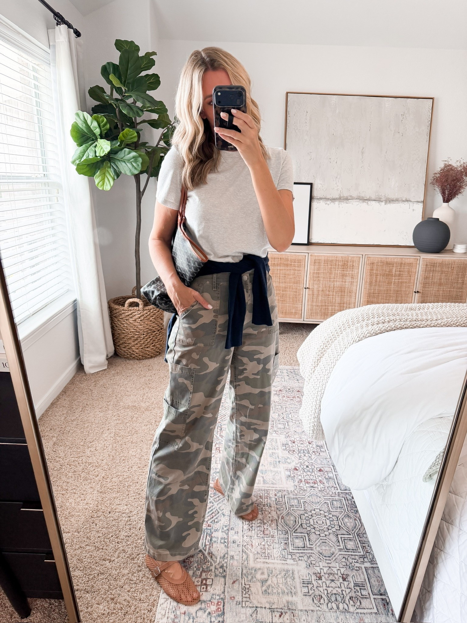 Camo is back in my fall rotation, and I love it paired with a simple grey tee to let the pants do the talking. A sweater tied at the waist and woven flats make this such a good outfit for those warmer fall days.

camo pants, camouflage pants, fall outfit, grey tee outfit, cargo pants, casual fall outfit, warm weather fall style, woven flats, transitional fall outfit, everyday fall style, camo outfit ideas, HauteandHumid

#LTKootd #LTKOver40 #LTKSeasonal