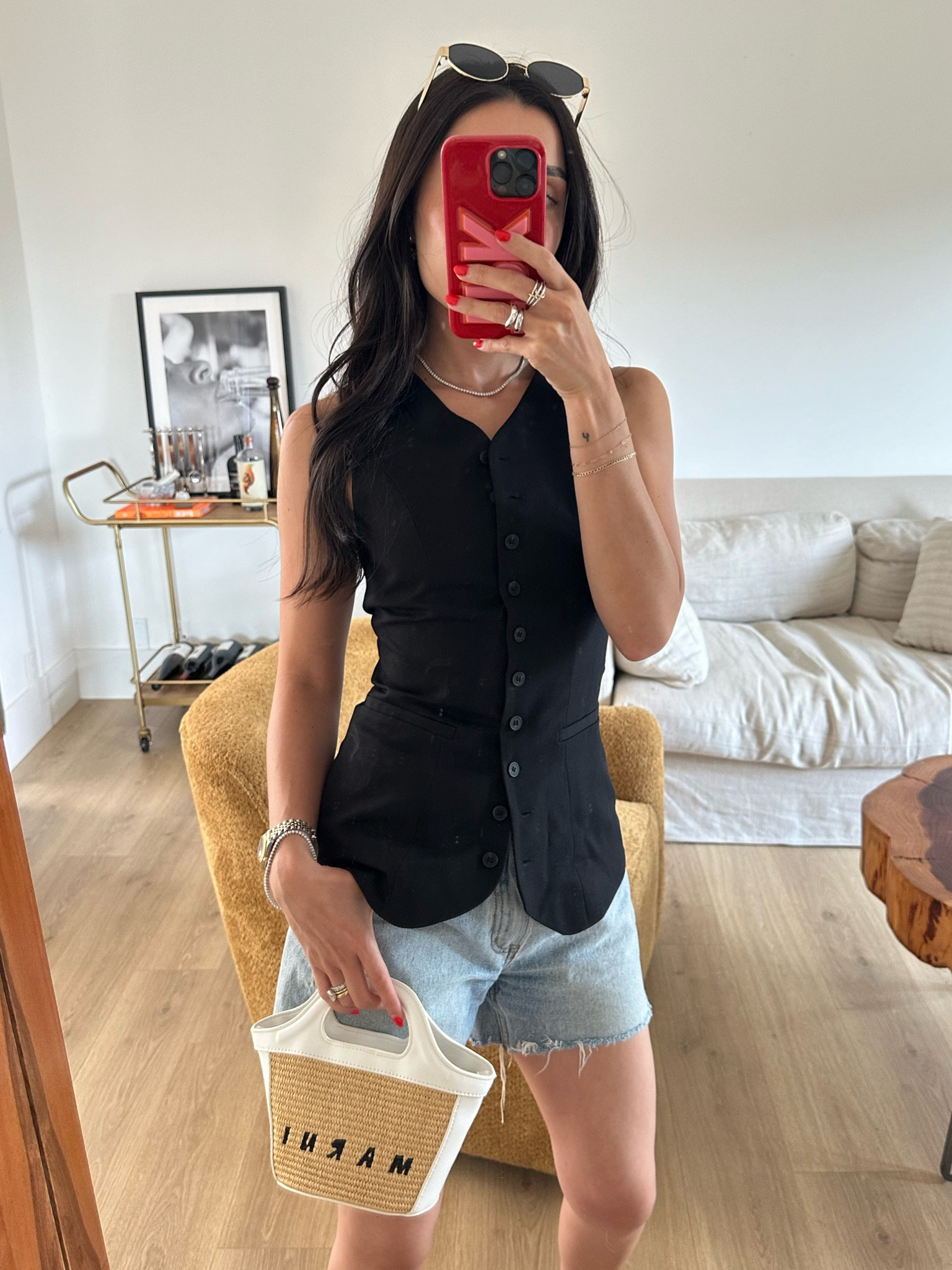 Wine tasting outfit. Been looking for a long line vest like this that’s more fitted and she’s a good affordable option!! Wearing it with my brandy melville shorts.

#LTKFindsUnder100 #LTKStyleTip #LTKItBag