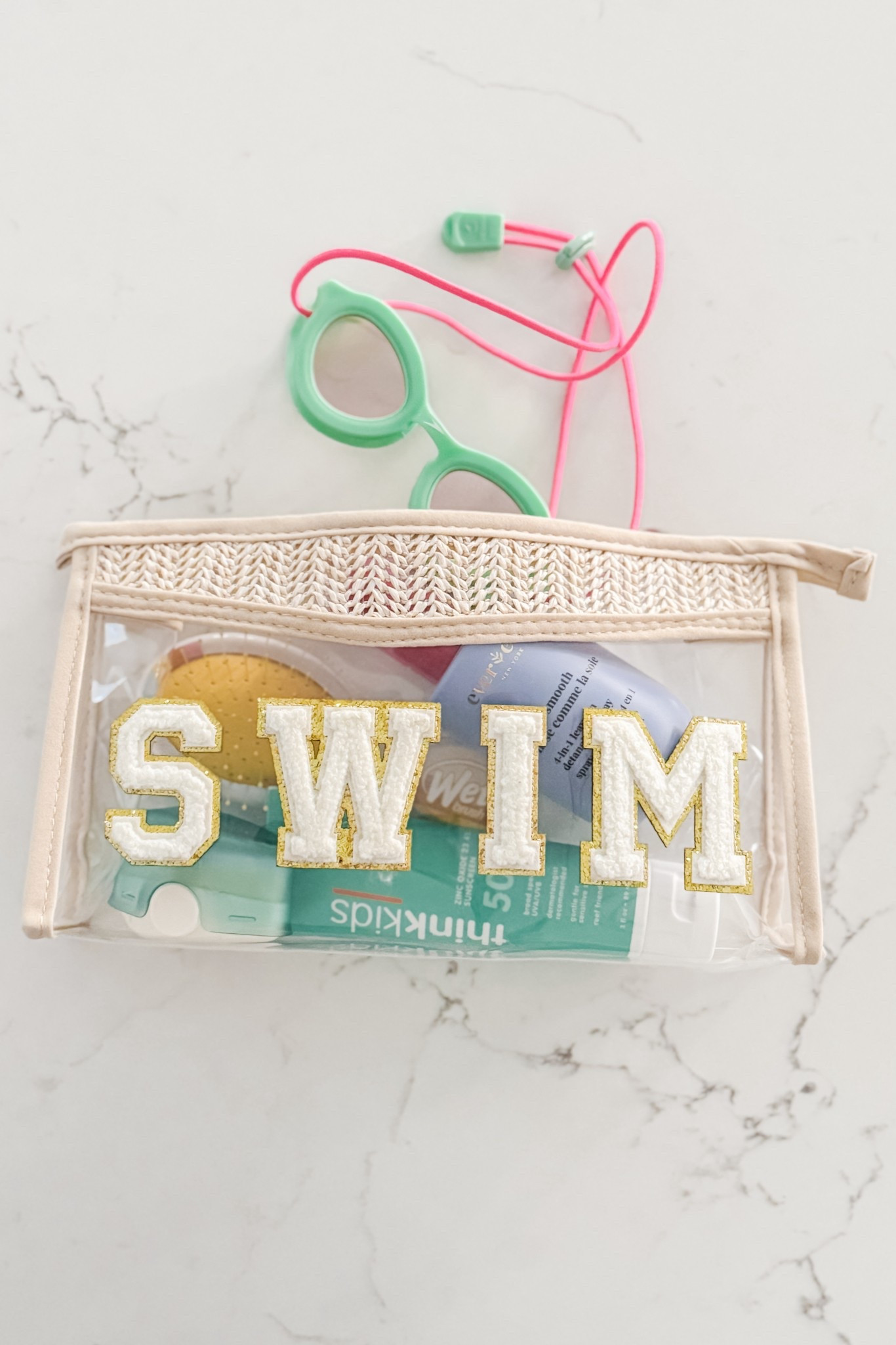 I love this little organizer bag for wrangling all of the smaller items inside our extra large swim tote! If fits our essentials perfectly. #LTKSummer

#LTKFamily #LTKKids