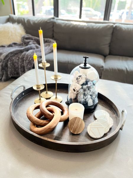 Cozy Halloween coffee table styling.  Love the faux flickering tapered light! 

#LTKHoliday #LTKhome #LTKHalloween