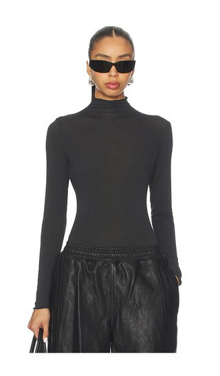 SKIMS Sheer Modal Long Sleeve Turtleneck Bodysuit in Black. - size L | Revolve Clothing (Global)