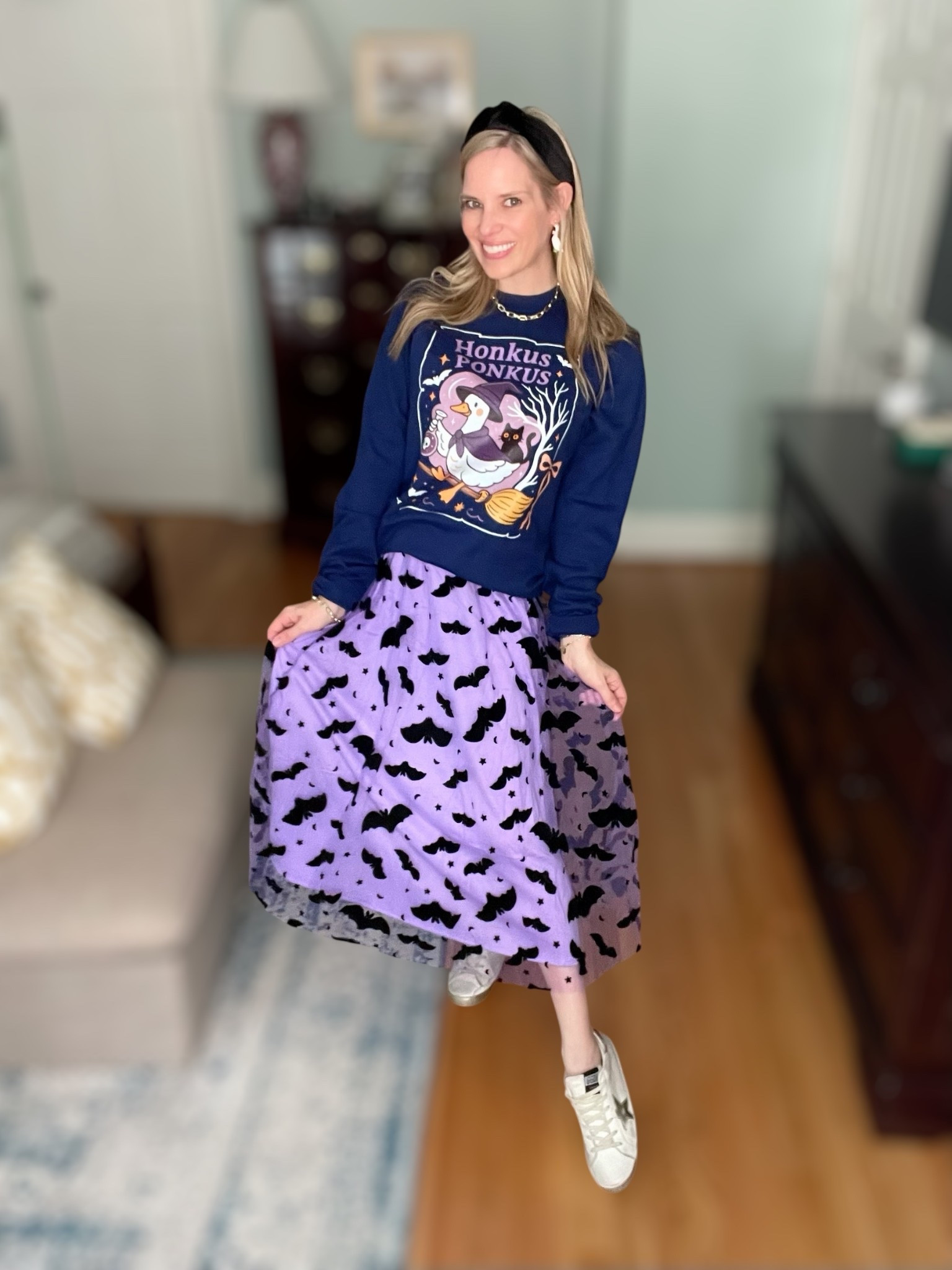 Spooky season but make it cute 💜🦇✨ I couldn’t resist this Honkus Ponkus Halloween sweatshirt—the goose on a broomstick with a little black cat is just too perfect! Paired with a purple bat tulle skirt, it’s giving all the playful Halloween vibes while still comfy enough for everyday wear.

I styled it with Golden Goose sneakers for a casual cool-girl touch, a black velvet knotted headband for a little polish, and of course my goose earrings for a cheeky nod to the theme. Finished with gold accents like my Lil Frankie chain necklace for a little sparkle.

This is the ultimate casual Halloween outfit idea—perfect for school parties, trick-or-treating, or just cozy fall days when you want to feel festive without a full costume. 🎃

 Halloween outfit ideas, Honkus Ponkus sweatshirt, spooky season style, casual Halloween look, fun fall fashion, bat tulle skirt outfit, Golden Goose sneaker style, Halloween graphic sweatshirt, cozy festive outfit


#LTKFindsUnder100 #LTKOver40 #LTKFindsUnder50

#LTKOver40 #LTKFindsUnder100 #LTKFindsUnder50