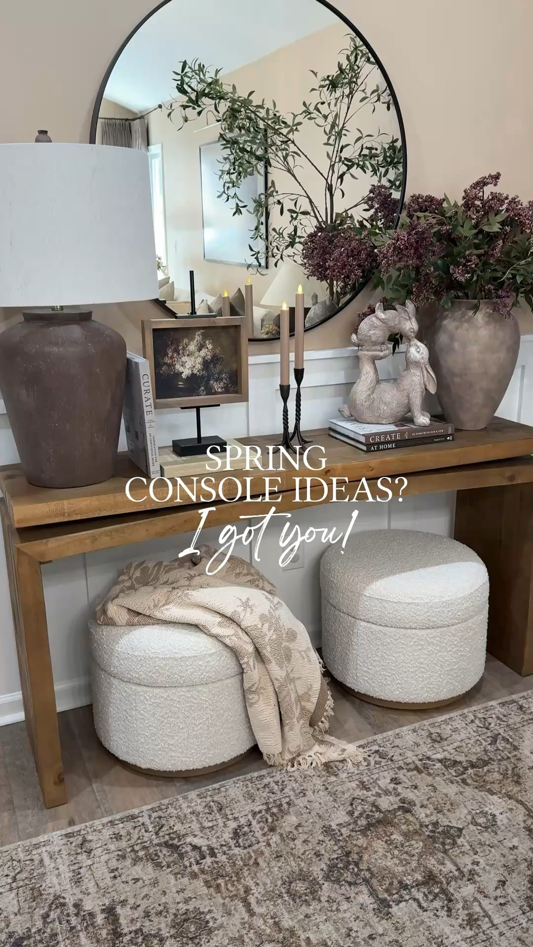 Spring Console. Follow @farmtotablecreations on Instagram for more cozy home inspiration and styling ideas.

These berry stems are one of my favorite ways to add a simple seasonal touch while keeping everything warm and neutral. I paired them with stacked books, candlesticks, adorable kissing bunnies, and this beautiful 7x9 artwork from Brittany @currentlychic in the Briarsmoke stained frame for a layered, cozy look.

Use code FARMTOTABLE to save 15% off the artwork.

#consoletable #entrywaydecor #entrywaytable #tablelamp #homedecor #berrystem #decorativevase #ottoman #arearug

#LTKHome #LTKSaleAlert
