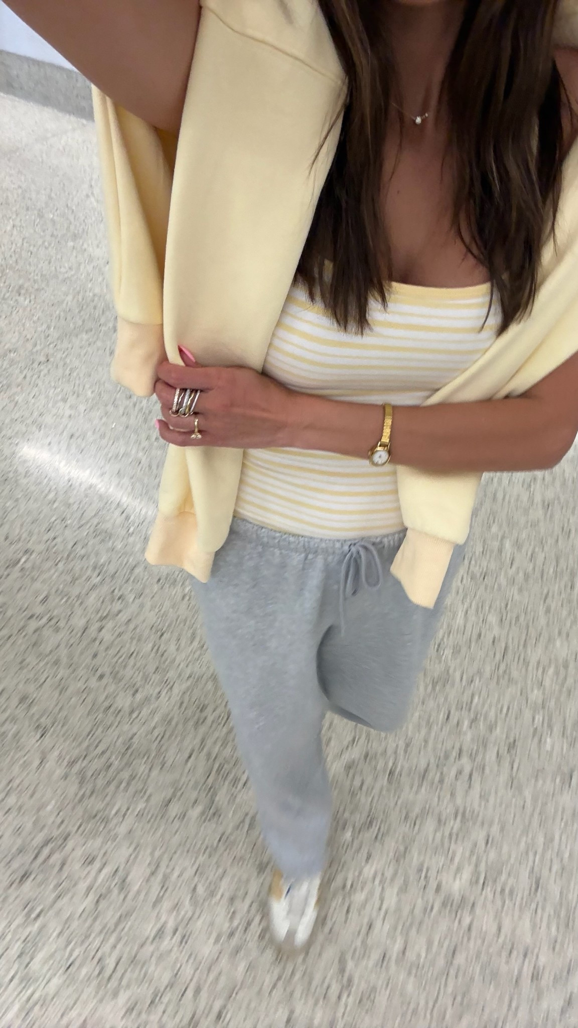 Casual travel day airplane outfit 💛 obsessed with this yellow hoodie sweatshirt & these bra free tanks from @abercrombie 
Gray sweatpants from @walmart

Spring outfit, travel outfit, airport outfit 