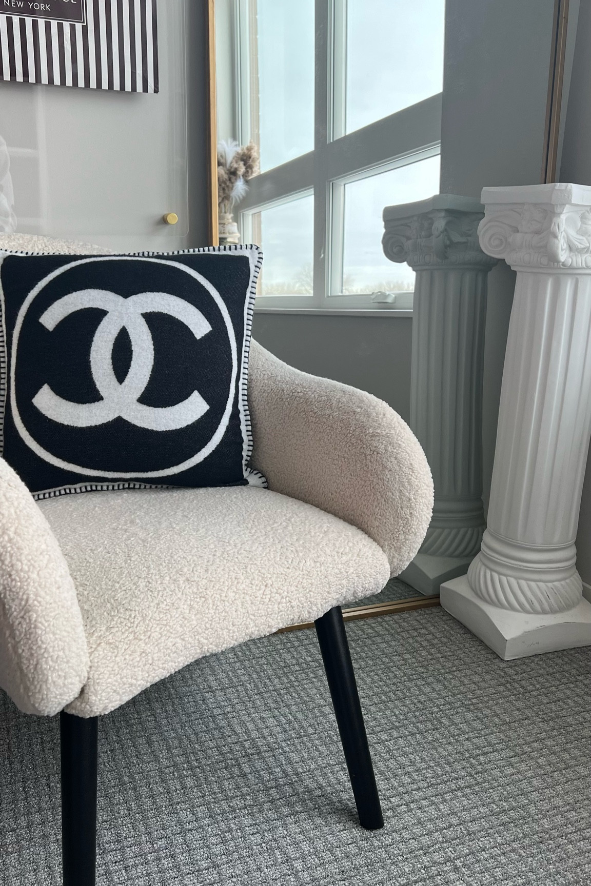 Gold mirror 
Sherpa chair 
Neutral home 

#LTKsalealert #LTKhome #LTKSale