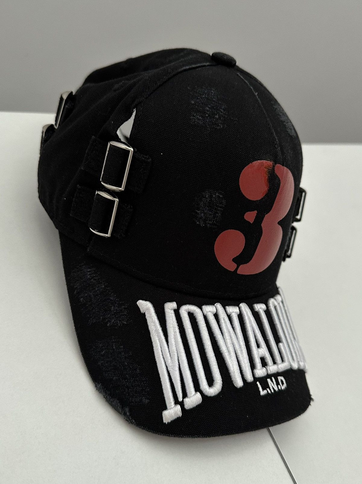 MOWALOLA DISTRESSED 3 BUCKLE CAP | Grailed