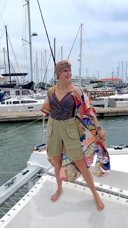 Swimsuit as a body suit. Worn under shorts. Layer a duster, dress and so many other options to change up a look. 
@amazon dress
@freepeopleshorts
@miraclesuitswim swimsuit 
@deandavidson earrings
@julievoss necklace 
#swimsuit #swimwear #turban #swimsuitcoverup #tropicalprintdress #duster #cargoshorts #freepeople #baggyshorts #chunkygoldjewelry #travelstyle

#LTKunder50 #LTKSeasonal #LTKswim