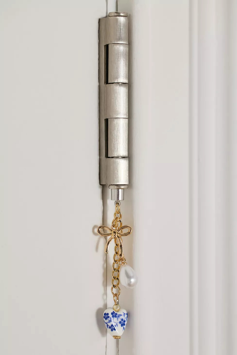 Charm Dangle Door Hinge Magnet | Urban Outfitters (US and RoW)