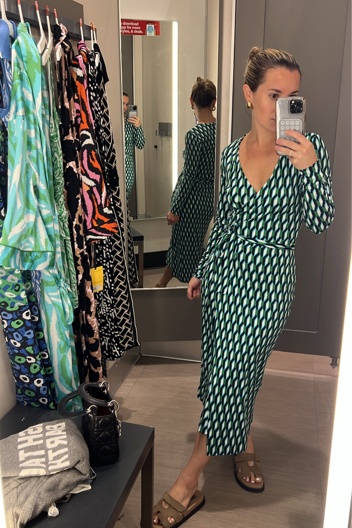 DVF x Target just dropped a limited capsule collection! 

Run if you’ve always wanted one of DVF famous wrap dresses. Wearing an XXS. 

This green, blue, black wrap dress is so chic. 

Perfect Easter dress, spring break dress, vacation dress, work dress 

#LTKworkwear #LTKtravel #LTKfindsunder50