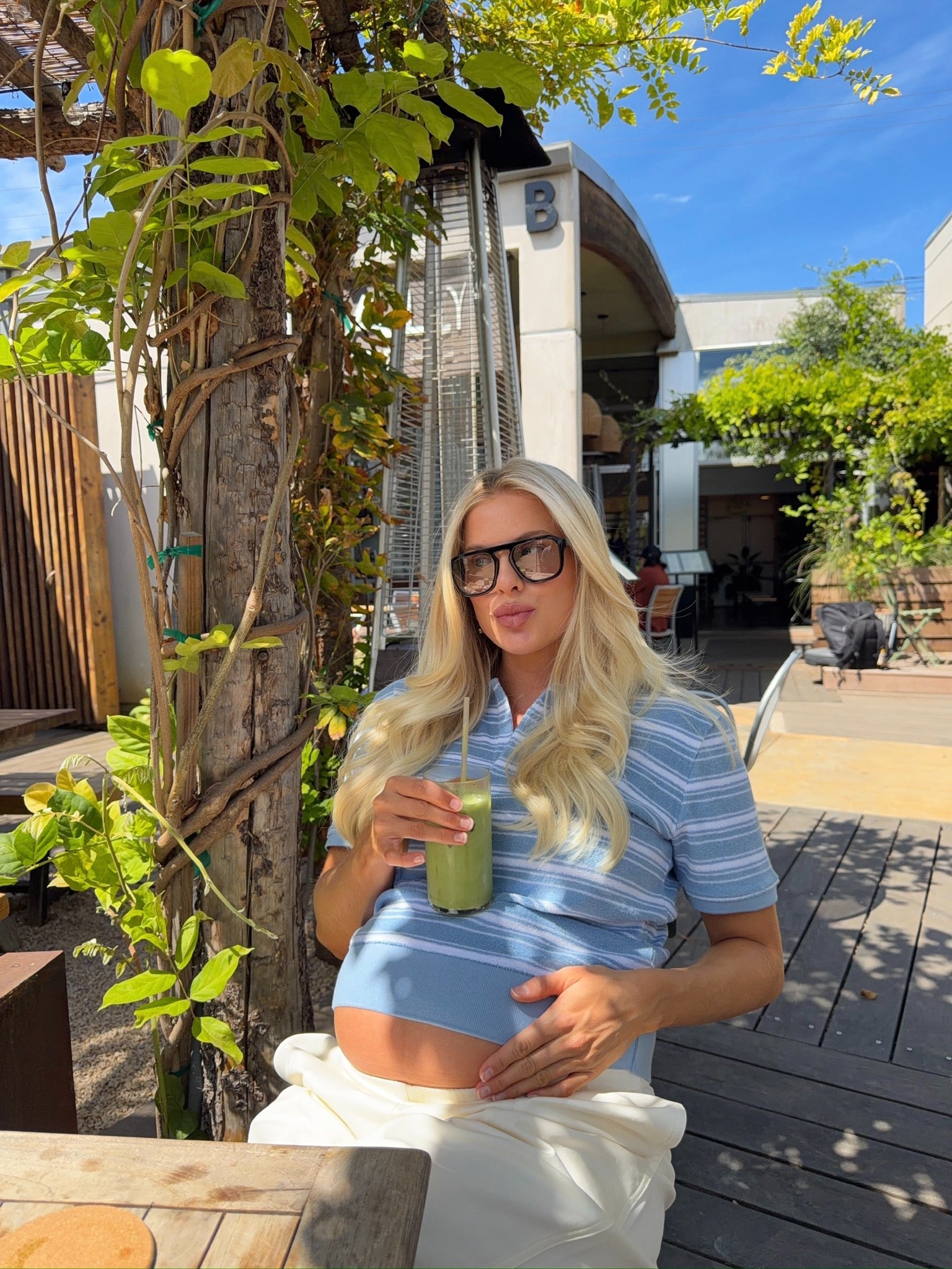 Wearing a medium in top & bottom (sized up for pregnancy), shoes are tts! Lip liner is toffee, gloss is shake! #kathleenpost

Spring transition outfit, spring outfits 2026, bump friendly, maternity look, errands outfit, casual chic look, lunch date look

#LTKootd #LTKBeauty #LTKBump