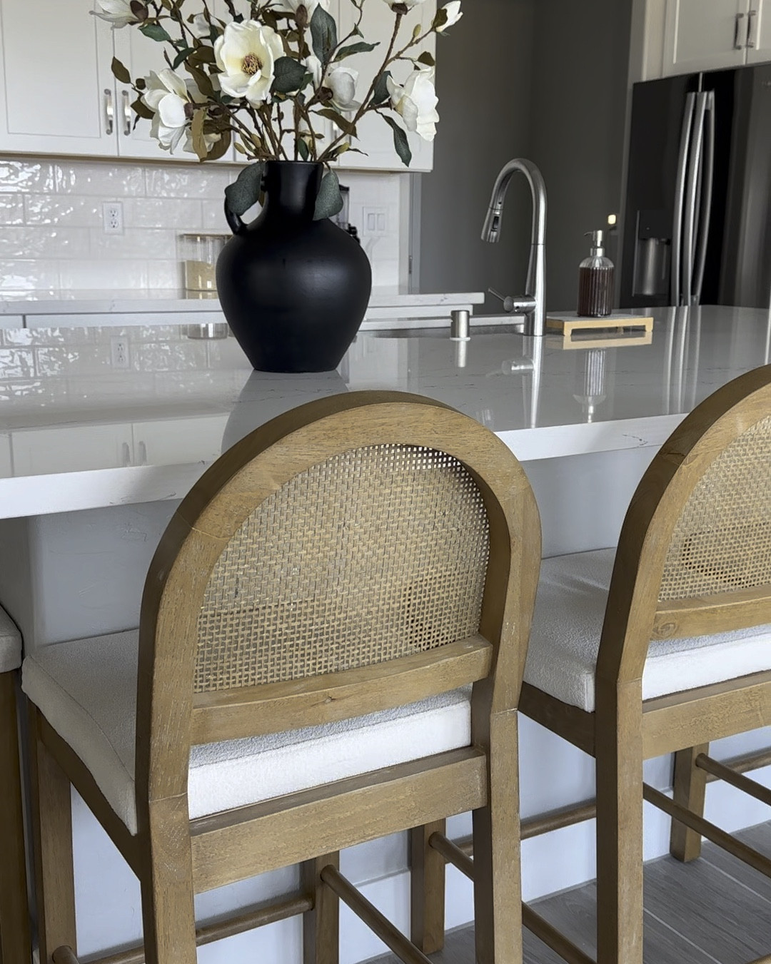 Boucle & Rattan Counter Stool Light Brown and the Solid Wood, Rattan & Glass Top End Table 🫶🏻 the perfect addition to our kitchen and living room!

#LTKSeasonal #LTKVideo #LTKHome