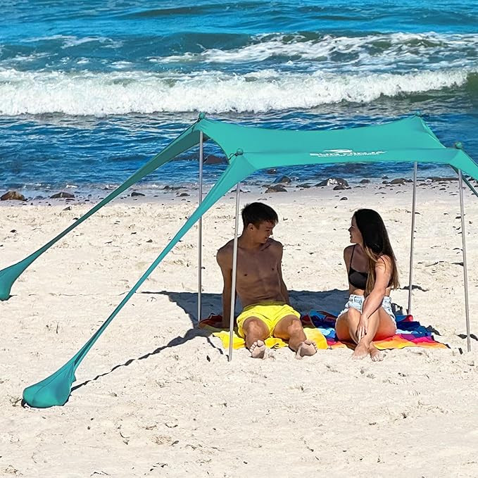 SUN NINJA Beach Tent Shelter with UPF50+ Protection, Includes Sand Shovel, Ground Pegs, Stability... | Amazon (US)