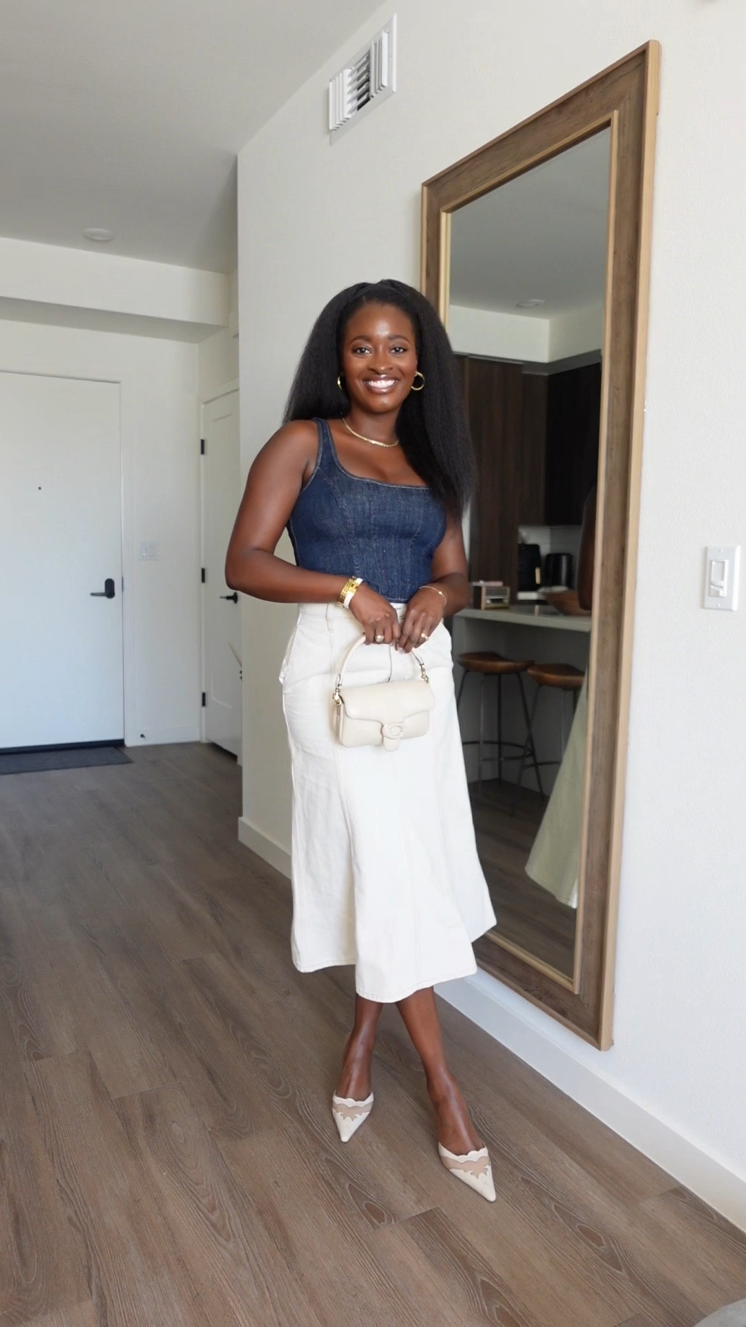 Transition to Fall with this denim bustier, cream skirt and pointy toe mules! 

#LTKstyletip #LTKSeasonal #LTKshoecrush