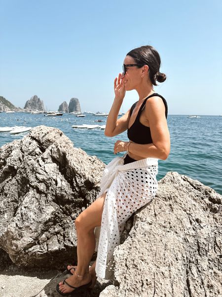 Love this eyelet sarong- so easy to throw on and go 
Black crinkle suit 
Italy outfit 

#LTKtravel #LTKswim