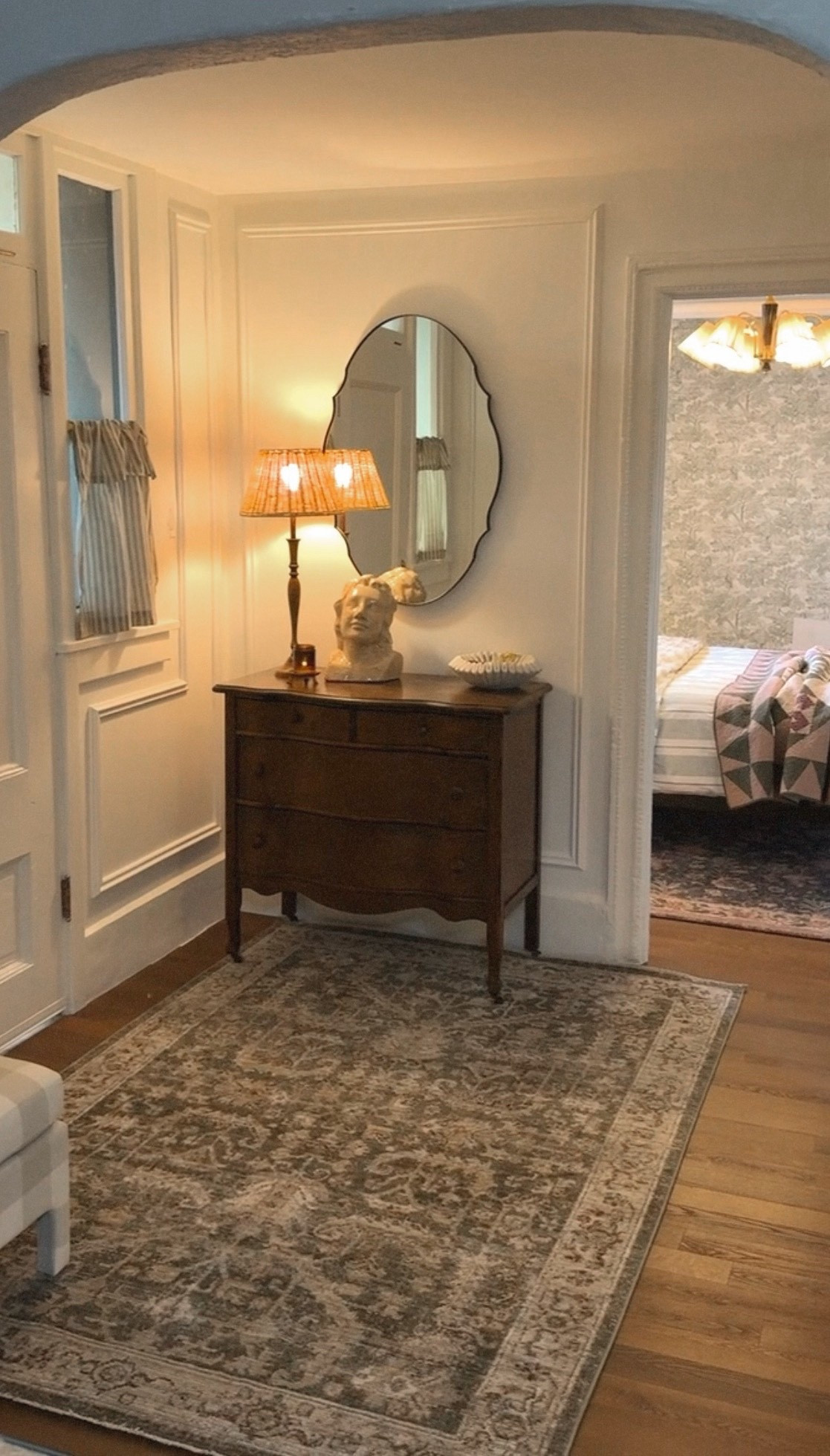 I styled the renovated basement entryway with wall molding, a vintage serpentine dresser, and a mix of some new and old decor.

#LTKFindsUnder100 #LTKFindsUnder50 #LTKHome